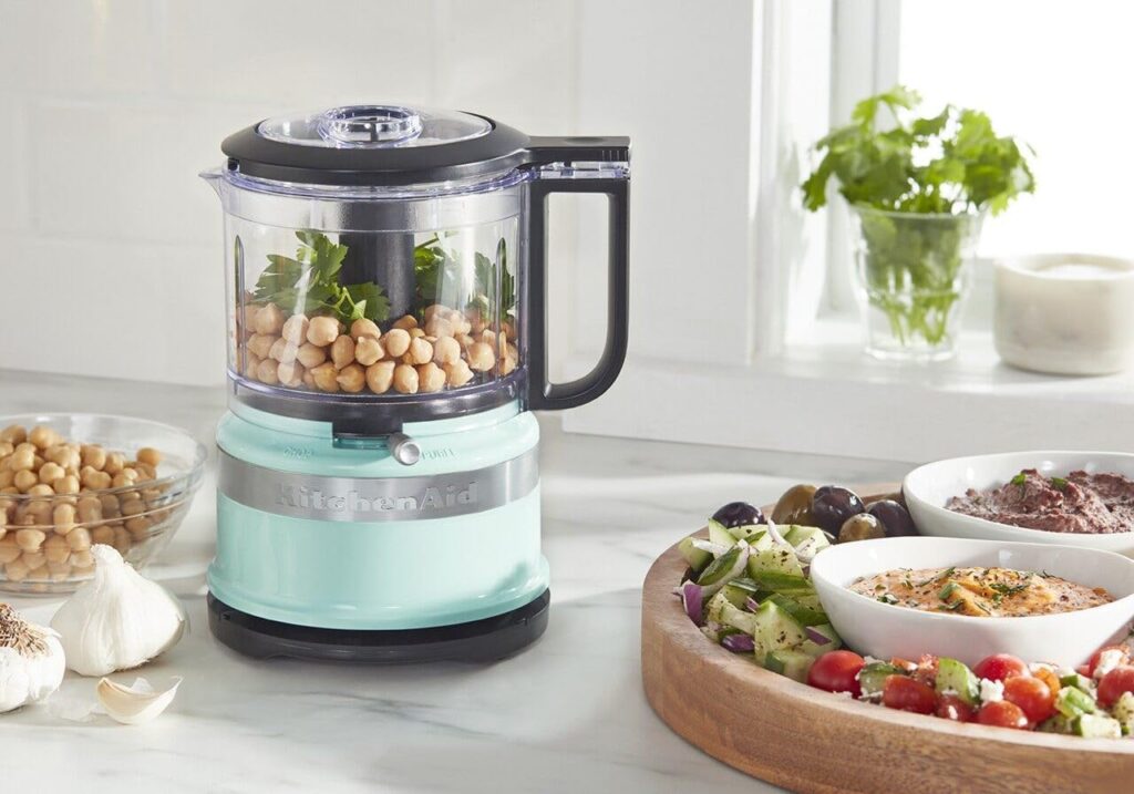 A food processor sitting on top of a counter