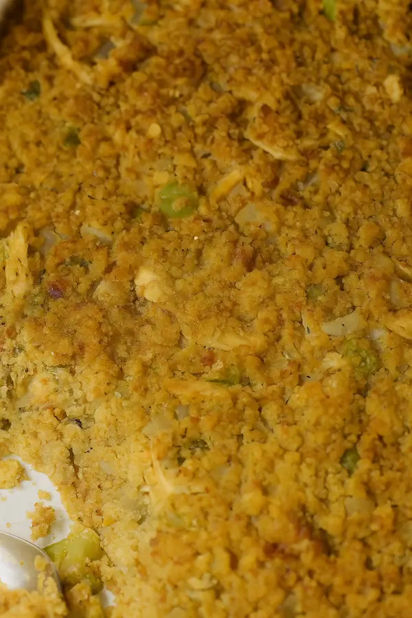 Southern Cornbread Dressing mixed with chicken in a dish