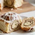 cinnamon sugar sourdough focaccia with cream Cheese Icing on a plate