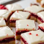 A festive close-up of freshly baked Christmas Cherry Bars cut into squares