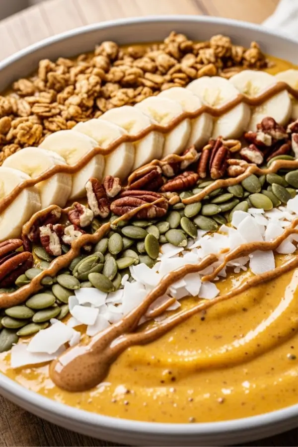 Serving Pumpkin Pie Smoothie Bowl for Fall Breakfast