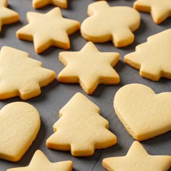 Cooling sugar cookie cutouts on the baking sheet