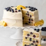 Three layer lemon blueberry cake with cream cheese frosting